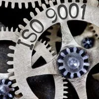 Oil and gas compliance manager reviewing digital ISO 9001:2026 requirements